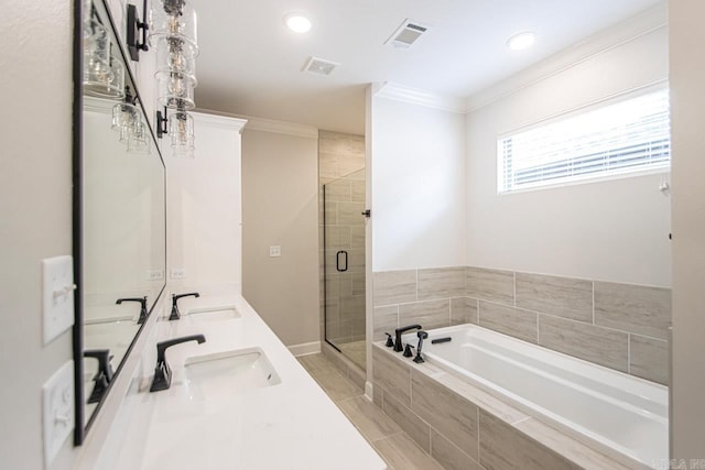 bathroom with vanity, wood-type flooring, ornamental molding, and shower with separate bathtub