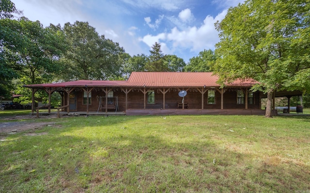 view of front facade featuring a front yard