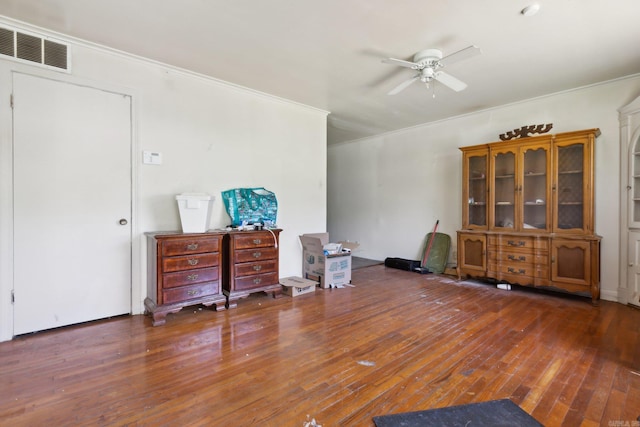 misc room featuring dark hardwood / wood-style flooring and ceiling fan