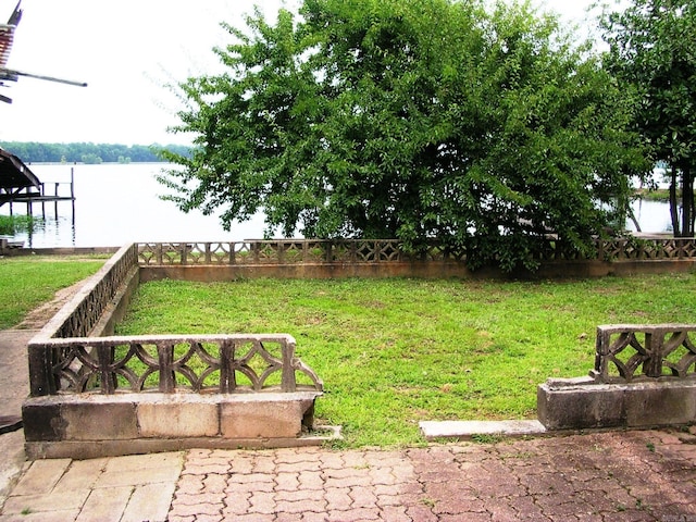 view of yard with a water view