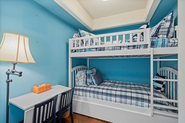 bedroom featuring dark hardwood / wood-style flooring