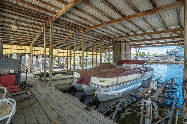 dock area featuring a water view