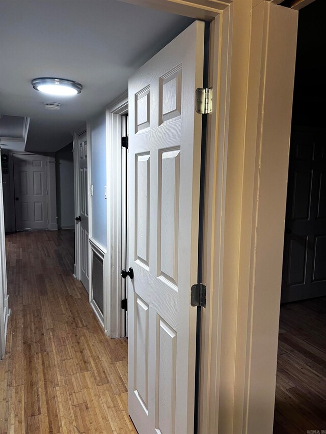 hall with light hardwood / wood-style flooring