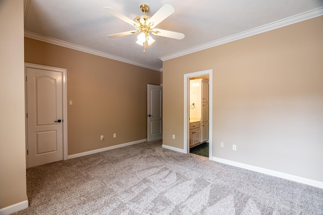 unfurnished bedroom with ceiling fan, ornamental molding, and connected bathroom