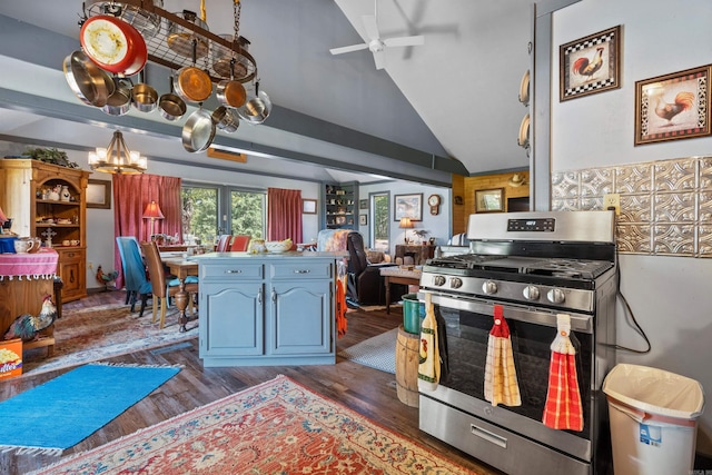 kitchen featuring an inviting chandelier, vaulted ceiling, gas stove, and wood-type flooring