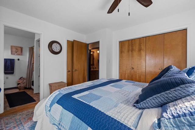 bedroom featuring ensuite bathroom, ceiling fan, and a closet