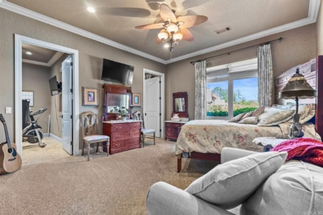 bedroom featuring ceiling fan, ornamental molding, and light carpet