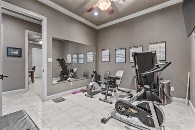 workout area featuring crown molding