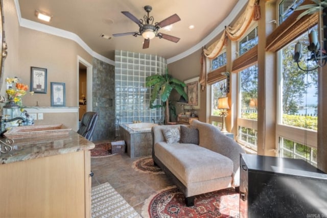 sitting room featuring crown molding, sink, and ceiling fan