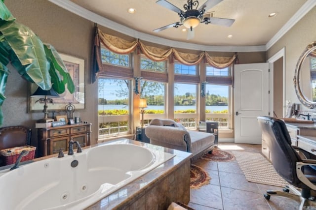 bathroom featuring a water view, plenty of natural light, crown molding, and tiled tub