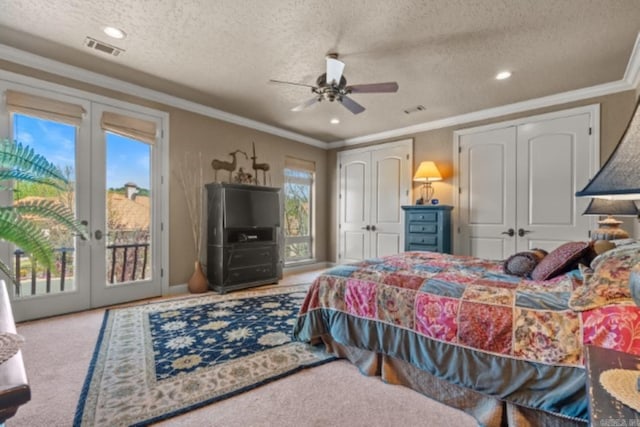 carpeted bedroom with access to exterior, ceiling fan, french doors, a textured ceiling, and ornamental molding