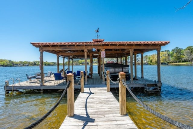 view of dock with a water view