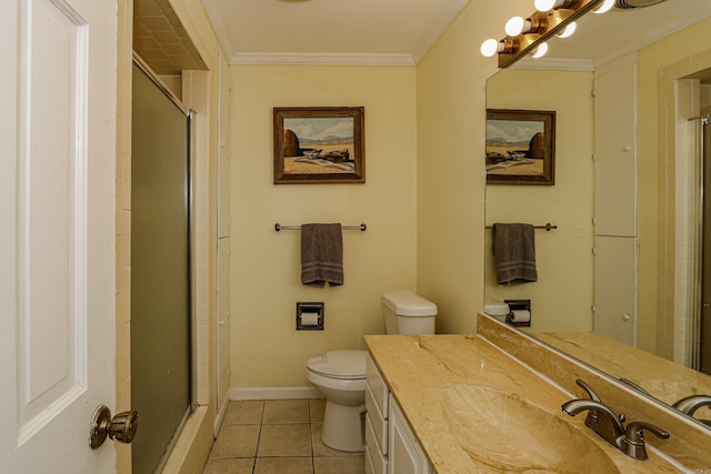 bathroom featuring tile patterned floors, crown molding, a shower with shower door, and toilet