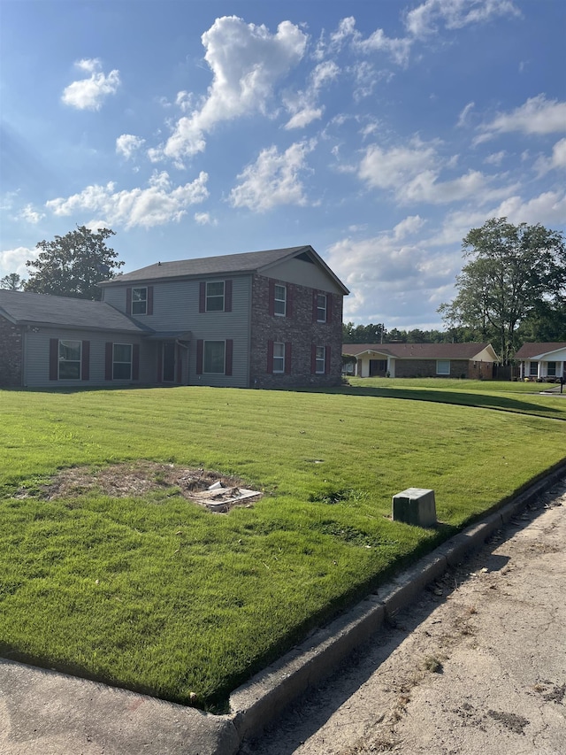 surrounding community featuring a lawn