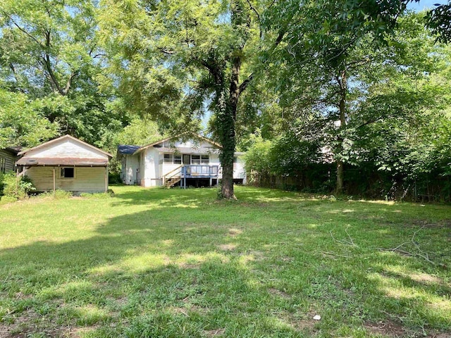 view of yard featuring a deck