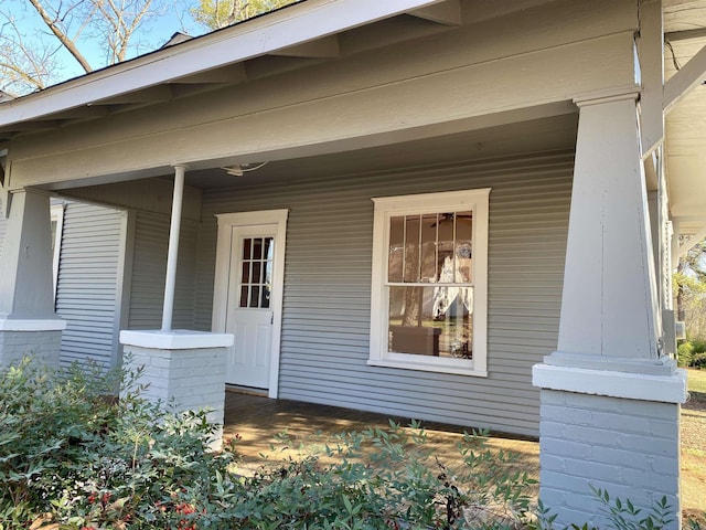 doorway to property featuring a porch