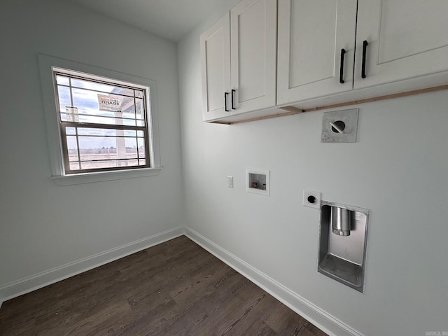 laundry area featuring hookup for a washing machine, dark hardwood / wood-style floors, electric dryer hookup, and cabinets