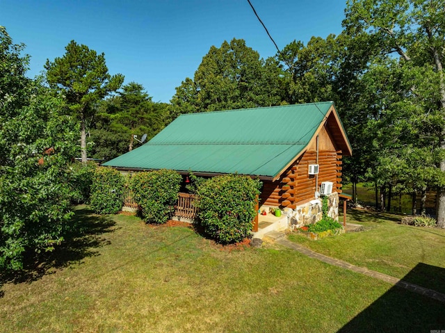 view of home's exterior featuring a lawn