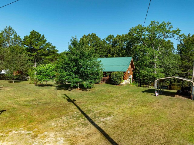 view of yard with a carport