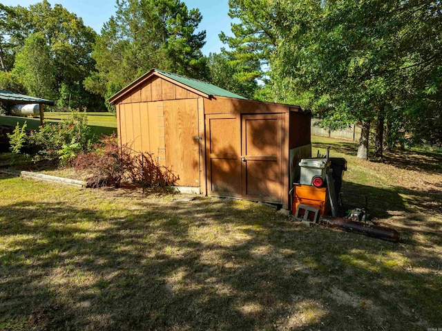 view of outdoor structure with a yard