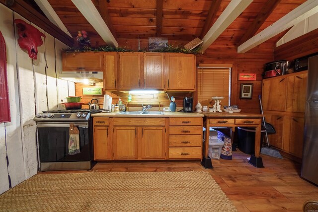 kitchen featuring sink, light wood-type flooring, vaulted ceiling with beams, and stainless steel range