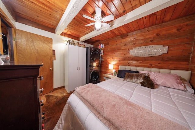 bedroom featuring beam ceiling, ceiling fan, wooden walls, and wood ceiling