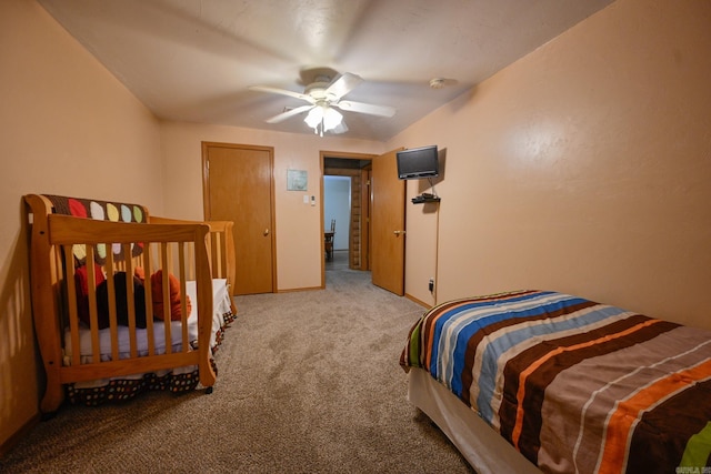 bedroom featuring ceiling fan and carpet flooring