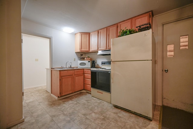 kitchen featuring white appliances and sink