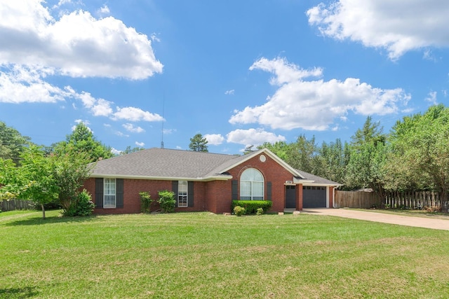 ranch-style home featuring a garage and a front lawn