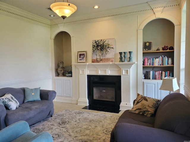 living room with carpet, built in features, and ornamental molding