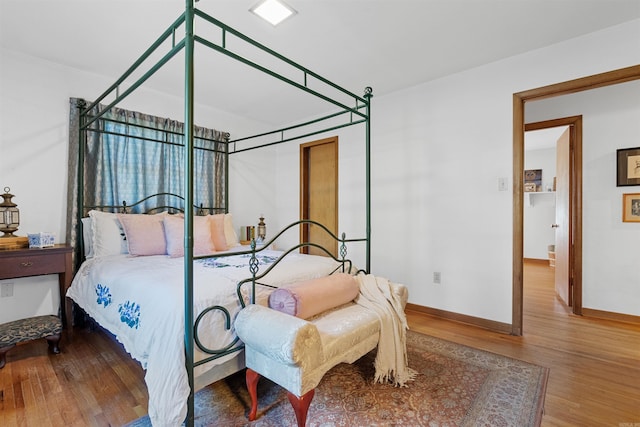 bedroom featuring hardwood / wood-style flooring