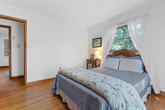 bedroom featuring light wood-type flooring