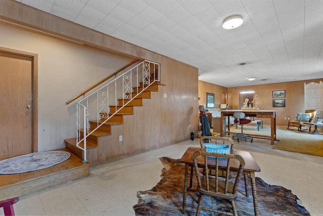 interior space featuring wood walls