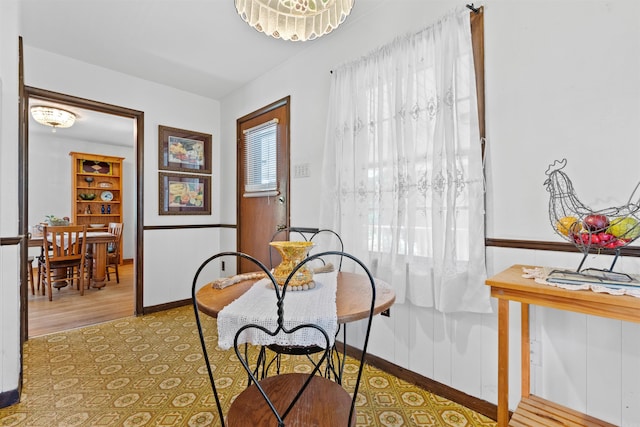 dining area with hardwood / wood-style floors