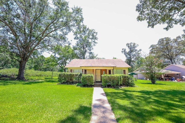 view of front of house featuring a front yard