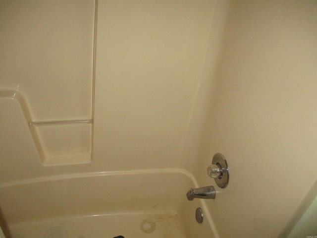 room details featuring shower with separate bathtub