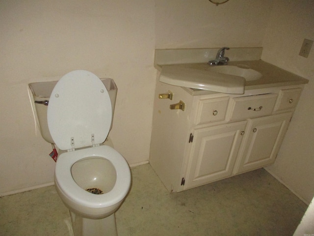 bathroom with toilet and vanity