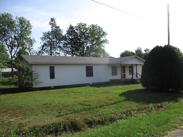 exterior space featuring a front yard and covered porch