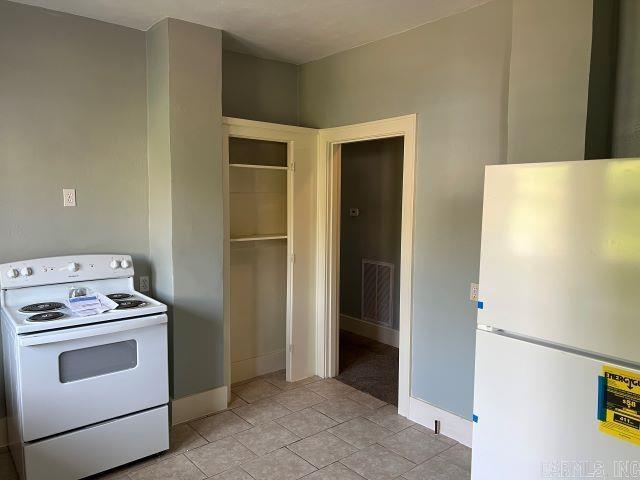 kitchen featuring white appliances