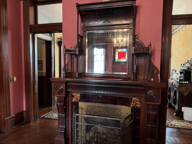 room details featuring an inviting chandelier and parquet floors