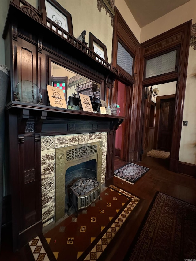 living room with a tile fireplace