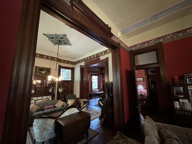 interior space featuring dark hardwood / wood-style floors and a chandelier