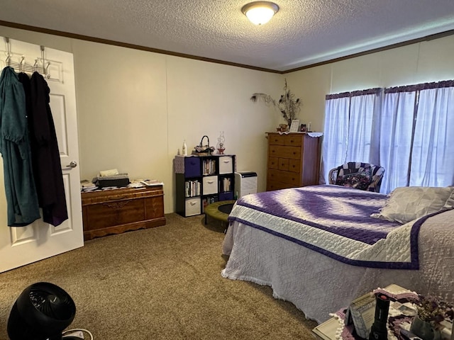 carpeted bedroom featuring a textured ceiling and ornamental molding