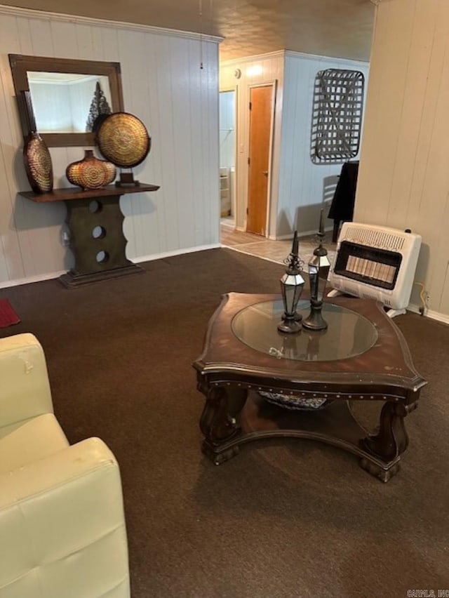 404 S Oak St, Fordyce, AR 71742 - living area with carpet floors, baseboards, and heating unit