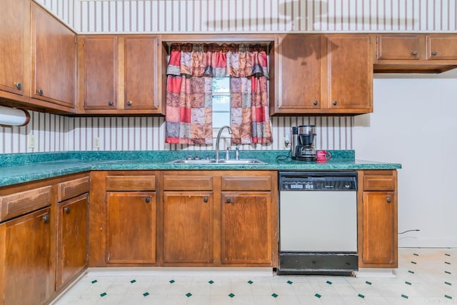 kitchen with sink and white dishwasher