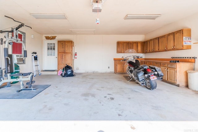 garage featuring a garage door opener