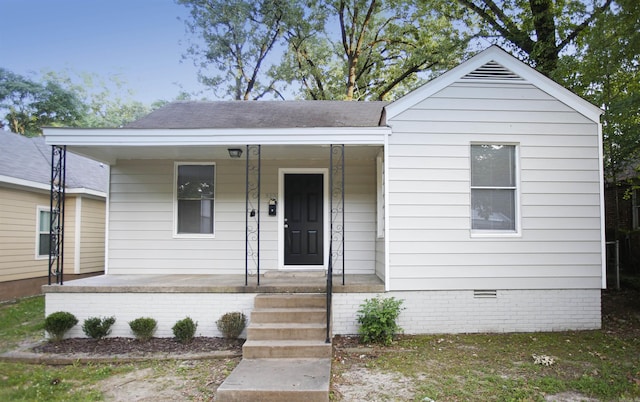 bungalow-style house featuring covered porch