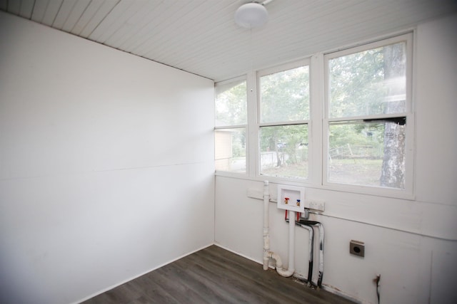 clothes washing area with electric dryer hookup, dark wood-type flooring, and washer hookup