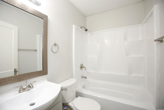 full bathroom featuring toilet, vanity, and  shower combination