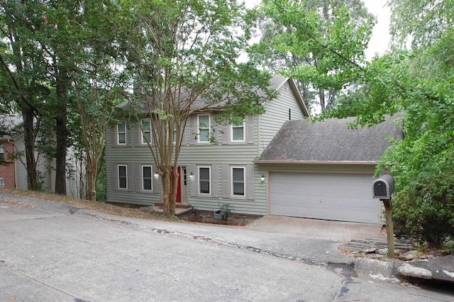 view of front of home with a garage